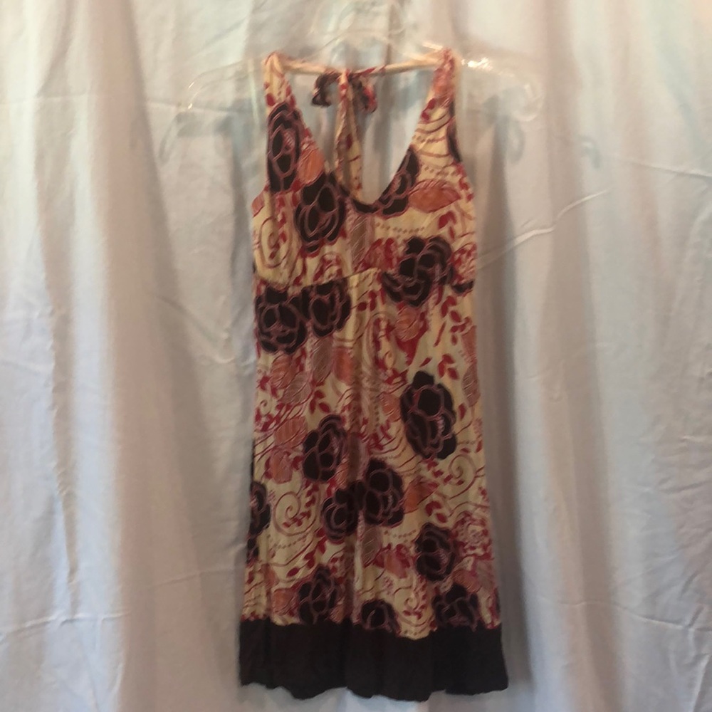 BUNDLE🛍3/$25 - SelfEsteem cream halter dress with beige/brown/red/orange print.